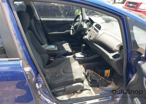 2009 Honda Fit Sport из США, поврежденный, VIN JHMGE88459S044601